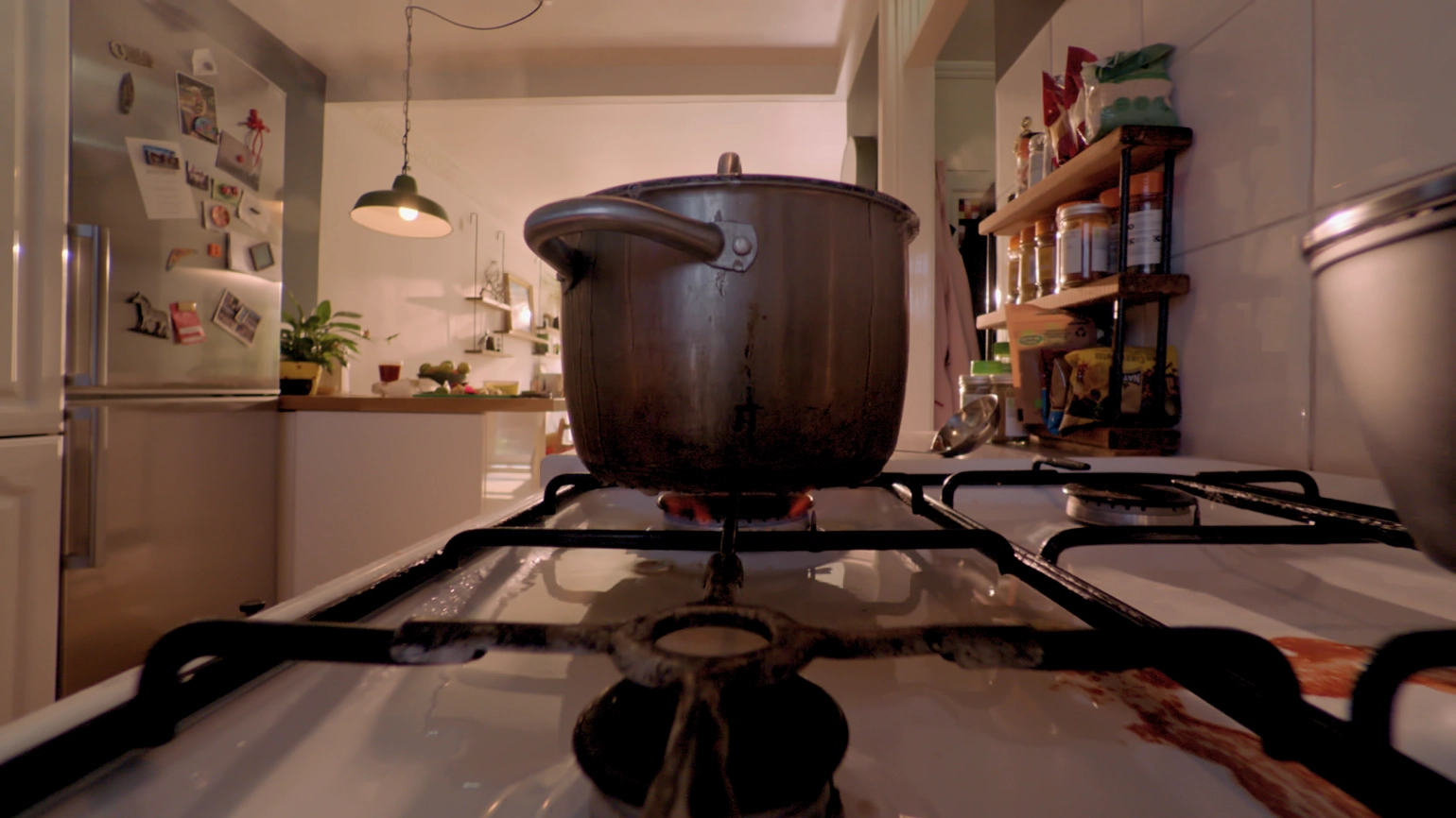 A pot is being cooked on a stove