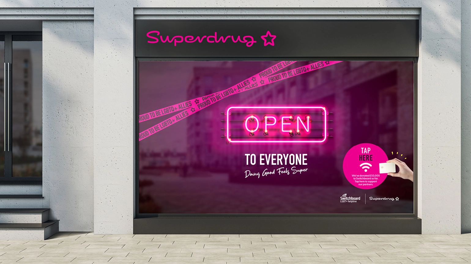 Mock up of a Superdrug shop window which shows a sign that says open to everyone