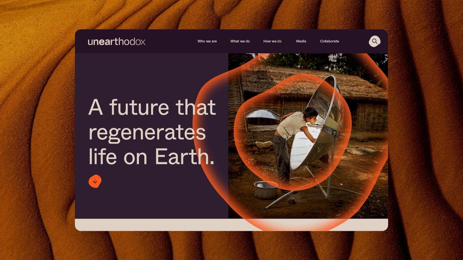A website screen sitting on top of an orange-brown wavey, layered sand-like textured background, the web screen shows an image of a surfer and the text 'A future that regenerates life on earth'